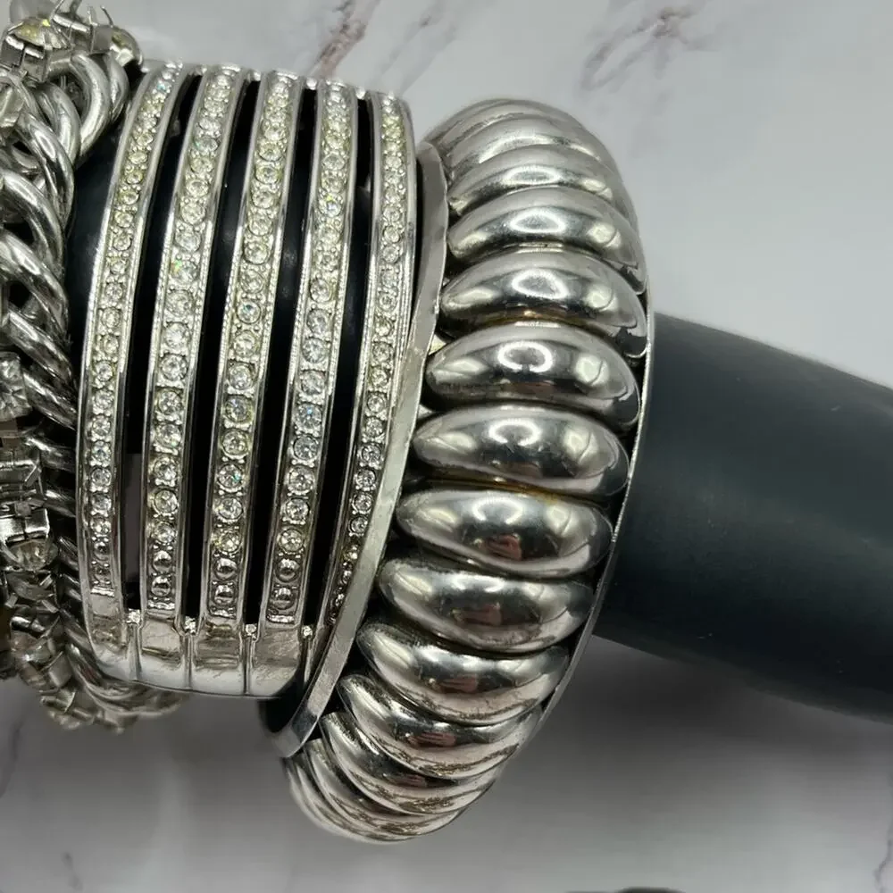 Set of 11 silver and gold tone bracelets